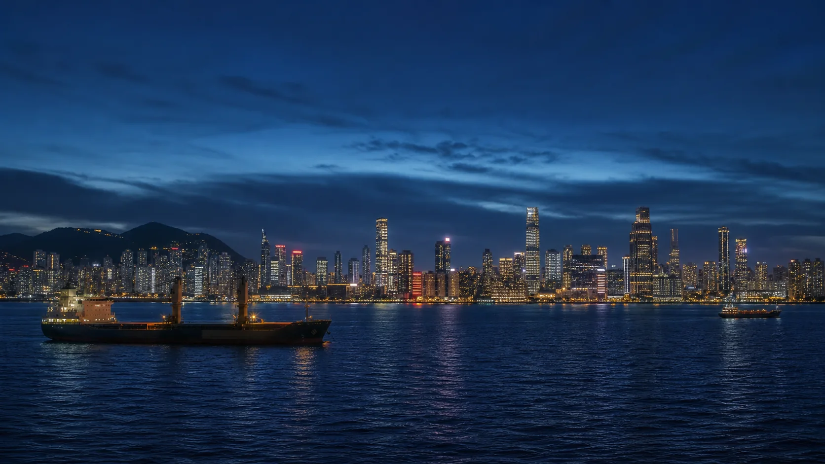 Hong Kong harbor and skyline at blue hour